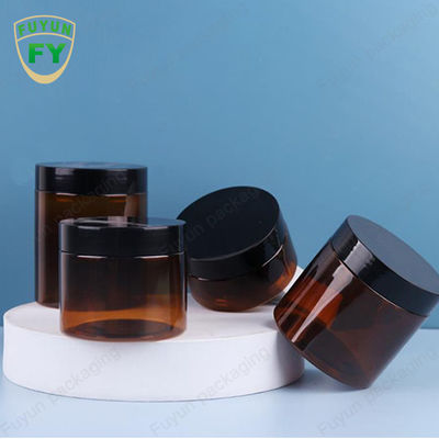 Le rond de 8 onces forment la crème cosmétique en plastique noire Amber Jar With Lid de plastique